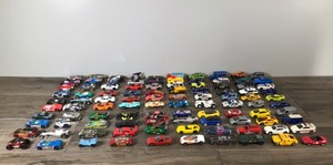 lot 48 image: Lot of 100 Matchbox  Hot Wheels Die Cast Cars and More