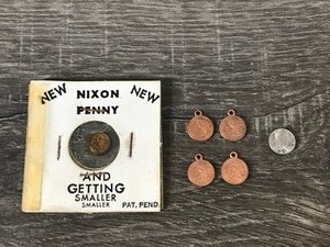 lot 60 image: 6 - Miniature Coins  Nixon Penny  4 Indian Head Pennies with Necklace Attachments  Kennedy half dollar