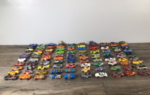 lot 73 image: Lot of 100 Die Cast Matchbox  Hot Wheels Cars and More