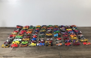lot 75 image: Lot of 100 Die Cast Matchbox  Hot Wheels Cars and More