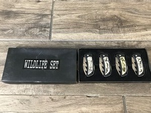 lot 88 image: 4 - Knife Wildlife Set - Bear - Deer - Eagle & Wolf Pictured on Knifes