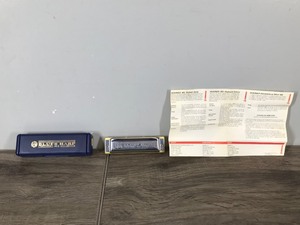 lot 127 image: Hohner Blues Harp Harmonica - Made in Germany - Case and Instructions