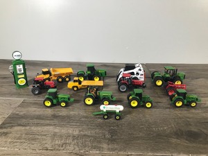 lot 136 image: Lot of Die Cast Tractors and More - John Deere - Bobcat - Case - International