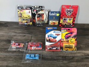 lot 137 image: Lot of 9 Die Cast Race Cars and More in Original Packages