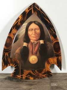 lot 150 image: Vintage Cheyenne Chief Little Wolf Image On 13 Wooden Arrowhead Plaque