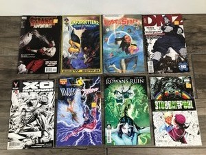 lot 436 image: Lot of 8 Comic Books - DMZ - Lost in Space - The Unforgottens  - Strange Adventures - Steed and Mrs Peel - Rowans Ruin - Hudro  Pyroman - X-O Manowar