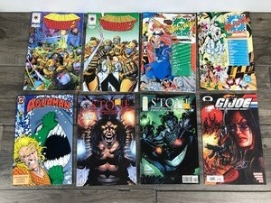 lot 447 image: Lot of 8 Comic Books - WHOs Who - Armorines - GI Joe - Stone - Aquaman