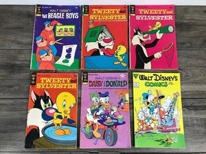 lot 454 image: Lot of 6 Comic Books - Tweety and Sylvester - Walt Disney The Beagle Boys - Walt Disney Comics and Stories - Daisy and Donald