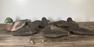 lot 488 image: 5 - Vintage Black Wood Silhouette Duck Decoys and 1 Animal Trap Co. Victor Mallard Decoy (Beak is missing)