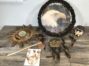 lot 495 image: Clock made out of Pheasant Feathers - 3 Dream Catchers - Native hammer made out of wood and bark - Drum made out of paper