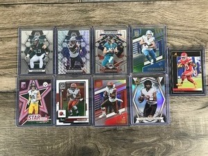 lot 502 image: Lot of 9 Football Cards - Tyreek Hill - T.J. Hockenson - Nick Chubb - Taulia Tagovailoa - Jason Kielce - Trevor Lawrence - Rhamondre Stevenson - T.J. Watt