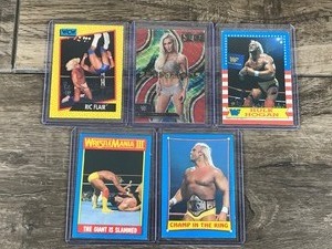 lot 515 image: Lot of 5 Wrestling Cards - Hulk Hogan - Ric Flair - Charlotte Flair - Andre the Giant