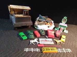 lot 610 image: Tonka dump truck, wood blocks, cars, horses and fence and more