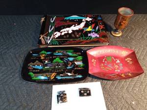 lot 611 image: Oriental lighters, oriental scrap book, trays, and more.