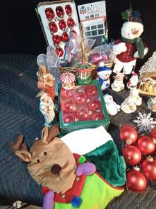 lot 598 image: Christmas items - glass bulbs, manger, Santas, trees & skirts, 2 stockings, snowmen, Merry-go-rounds, figurines and more