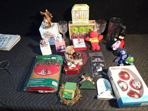 lot 587 image: 2002 Its A wonderful Life Christmas bulbs, Precious moments, Regina ornament, apple candles, Avon holiday treasures and more