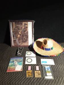 lot 568 image: 1987 twins Metrodome world Championship stamp and envelope, Twins vs Cleveland 2010 ticket, Roy Rogers View master discs, Military photo, toy gun holster, 1934 Tom Mix booklets, 1956 Lone ranger book and a sombraro