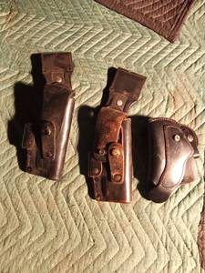 lot 563 image: 3 leather belt pistol holsters