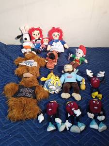 lot 396 image: Ragedy Ann & Andy, snoopy, Alf puppets, Curious George, California raisins, Keebler elf, and more plush characters