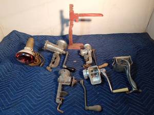 lot 394 image: Vintage juicer, 4 meat grinders, bottle capper, and a light