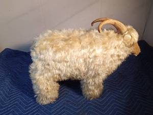lot 379 image: Solid wood goat covered with real goat fur and horns