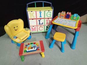 lot 329 image: V Tech learning desk & chair, childs 9 drawer wood organizer, childs reading chair and wood puzzle stool