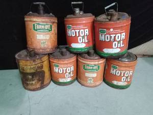 lot 328 image: 7 Motor Oil and Farm Oyl cans