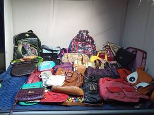 lot 286 image: 2 Back packs, purses, coolers and billfolds