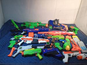 lot 279 image: Tote of nerf guns, cartridges and bullets