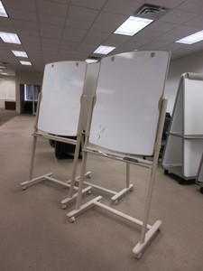 lot 903 image: QUARTET WHITE BOARD ROLLING EASELS