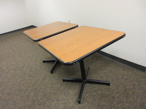 lot 947 image: STEELCASE LAMINATE TOP TABLES WITH HEAVY METAL BASES
