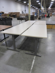 lot 322 image: HERMAN MILLER LAMINATE TOP TABLES WITH GRAY METAL BASES