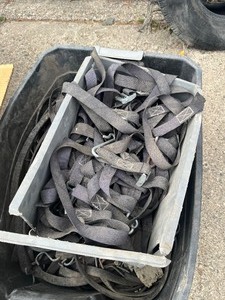 Tub Full of tarp straps and other straps