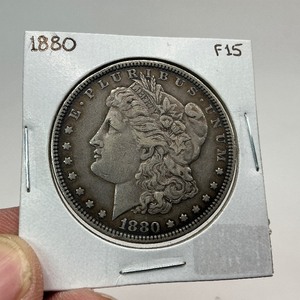 lot 30 image: 1880 Silver Morgan Dollar
