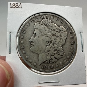 lot 33 image: 1884 Silver Morgan Dollar