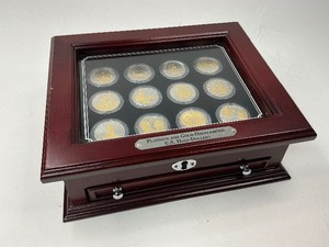 lot 72 image: 12pc Gold and Platinum Highlighted Commemorative Half Dollar Set in Cherrywood Box