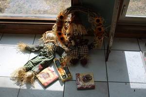 lot 13 image: Fall Harvest Decor Lot with Scarecrow and Sunflower Wreath