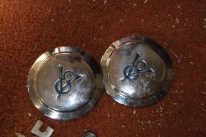 lot 25 image: Vintage Metal Hub Caps with Y8 Design - Set of 2