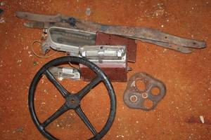 lot 29 image: Vintage Automotive Parts Lot Steering Wheel, Dashboard, and More