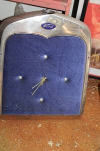 lot 34 image: Vintage Ford Radiator Cover with Clock