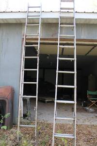 lot 48 image: Aluminum Extension Ladders - Set of 2