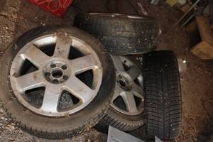 lot 86 image: Set of Four Used Car Tires with Rims