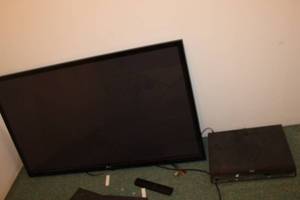 lot 92 image: LG TV and Sharp Aquos Blu-ray Player with Remote