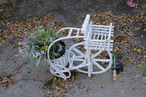 lot 110 image: Vintage White Bamboo Tricycle Planter with Artificial Flowers