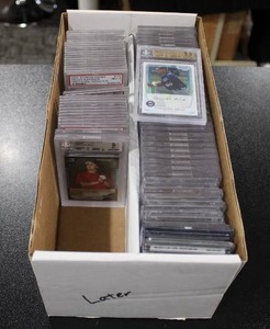 lot 216 image: Graded Mixed Grading Companies Bulk Slab Lot  75 Graded Cards