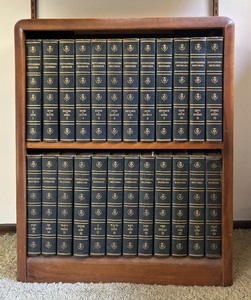 lot 229 image: Vintage Wooden Bookshelf with Encyclopedia Britannica Books Volumes 1-24