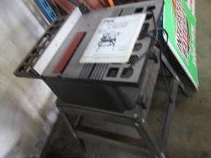 lot 8 image: Skil 10 table saw with owners manu...