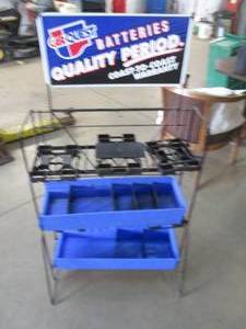 lot 104 image: Car Quest battery Retail display pl...
