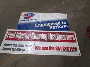 lot 124 image: Fuel Injector & Car Quest shop adve...
