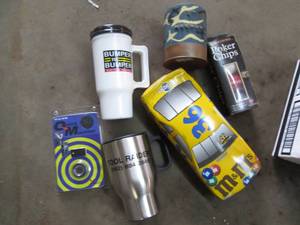 lot 126 image: Travel mugs and misc shop related f...